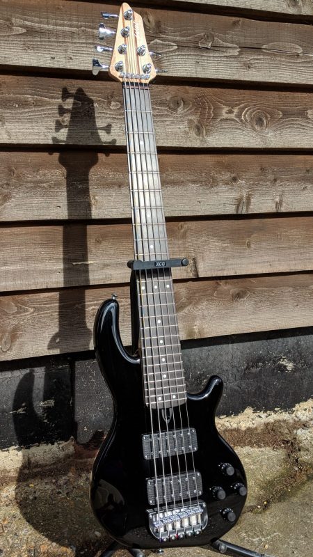 6-string Mk3 with gloss black body and a clear gloss neck.