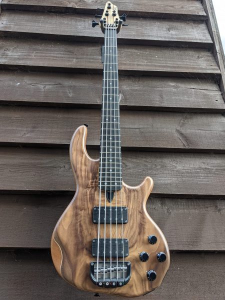 5-string Mk3 with American walnut facings, an ebony fingerboard and black tuners & retainer.