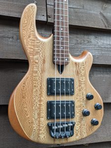 Mk2 with lacewood facings and a gloss black neck.